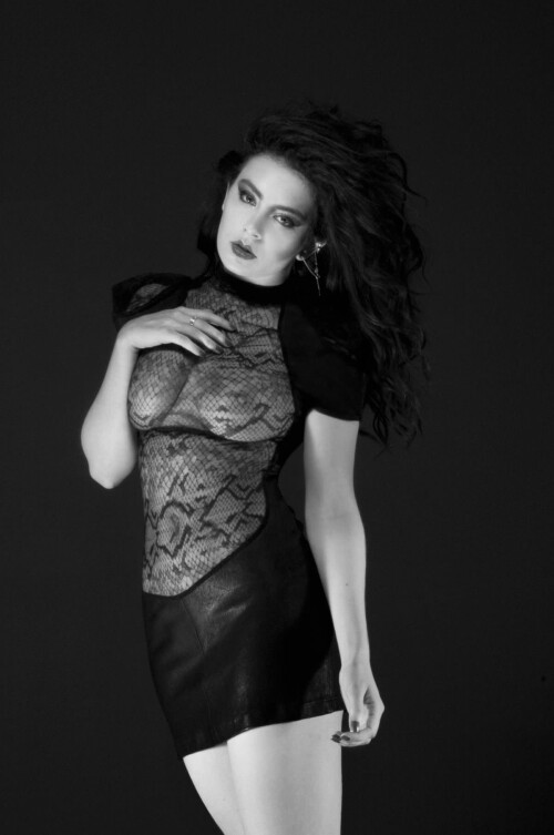 charli-xcx-posing-in-a-see-through-for-out-magazine-1.md.jpg